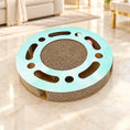 Cargar la imagen en la vista de la galería, Round mint corrugated cat scratcher on pale ivory marble
