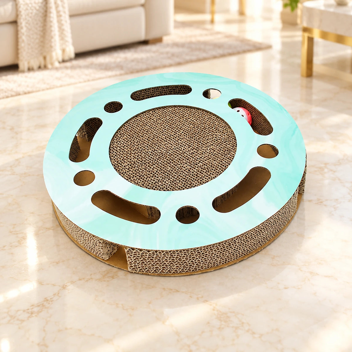 Round mint corrugated cat scratcher on pale ivory marble