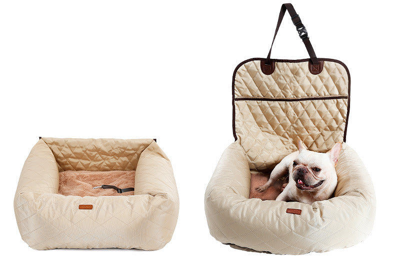 Beige dog car seat bed in pet bed mode with a French Bulldog relaxing inside, showcasing soft plush interior and convertible design