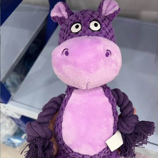 Close-up of a purple hippo plush rope dog toy showing soft texture and cotton rope limbs