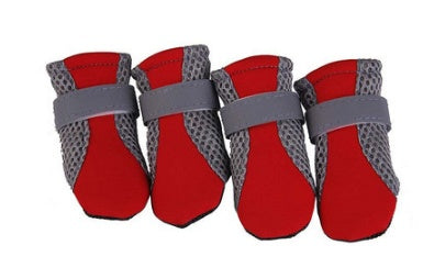 Four red breathable dog shoes with gray mesh sides and gray adjustable straps