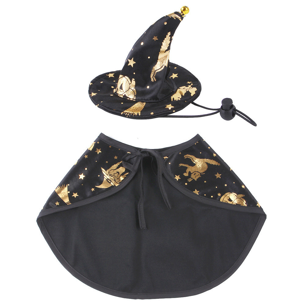 Black pet witch cape with gold Halloween-themed patterns and matching black and gold hat