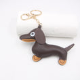 Load image into Gallery viewer, Brown faux leather sausage dog keychain on white background
