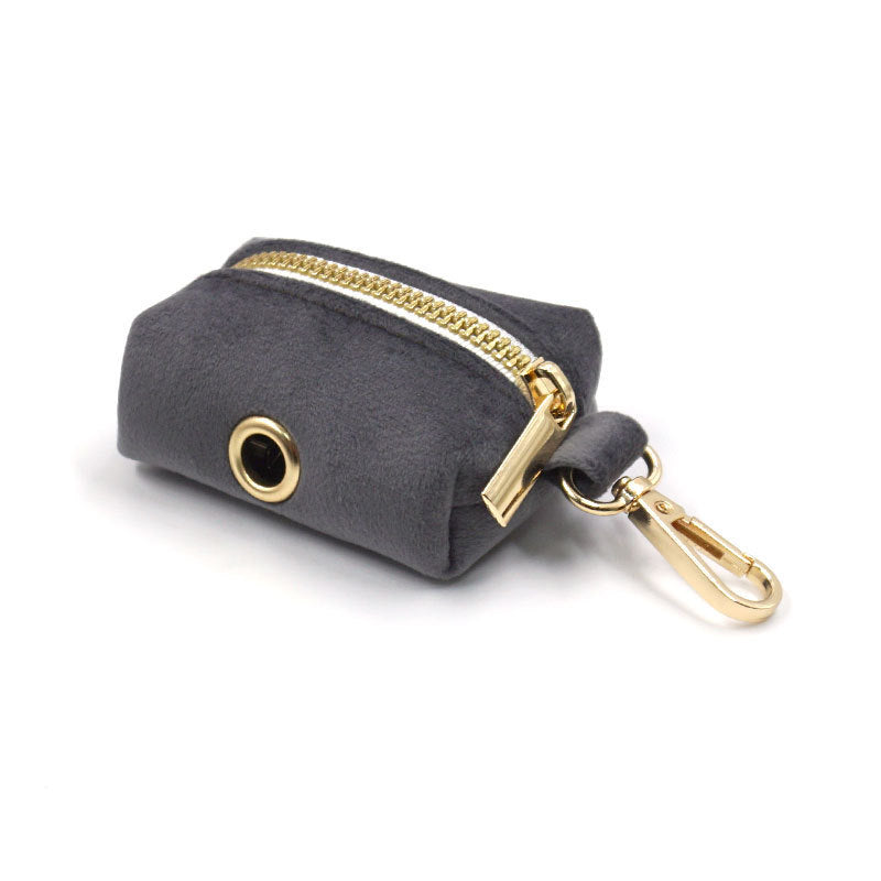 Dark gray velvet pouch with gold zipper and clip