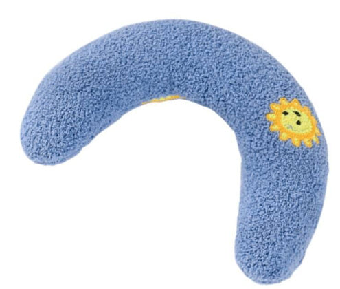 Blue U-shaped plush pet pillow with sun embroidery shown on beige background