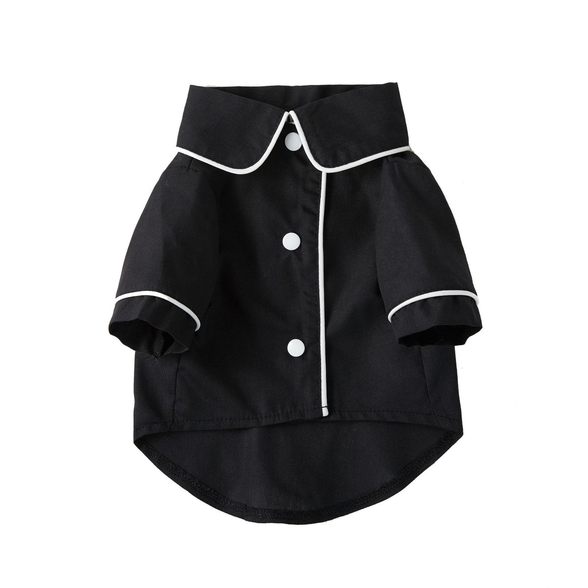 Black pet pajamas shirt laid flat showing white piping and buttons