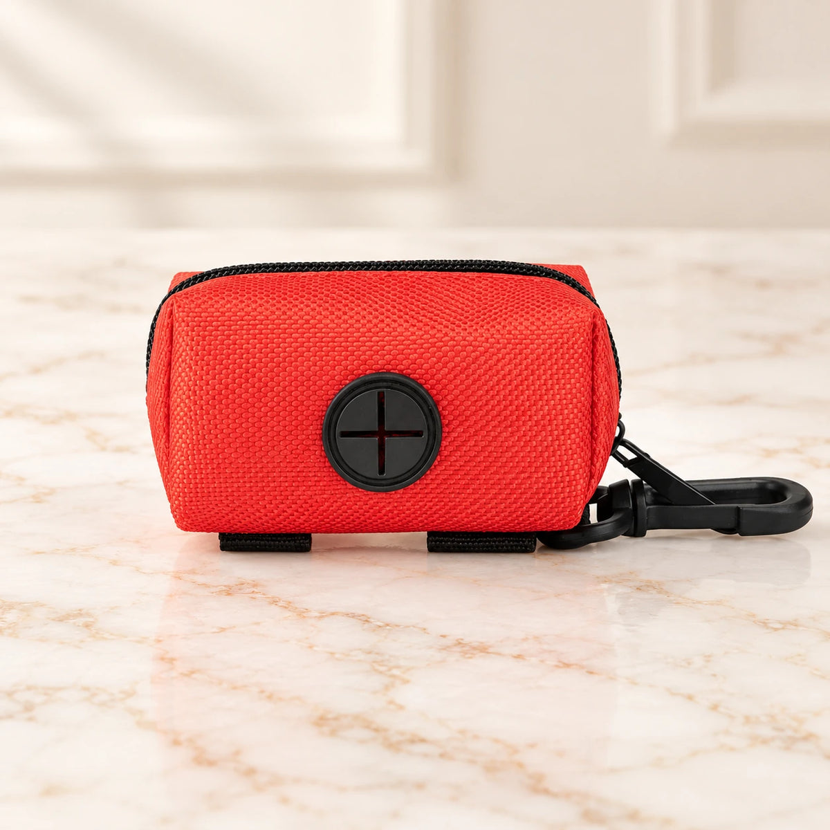 Red unlabelled waste-bag pouch with black clip and dispensing port
