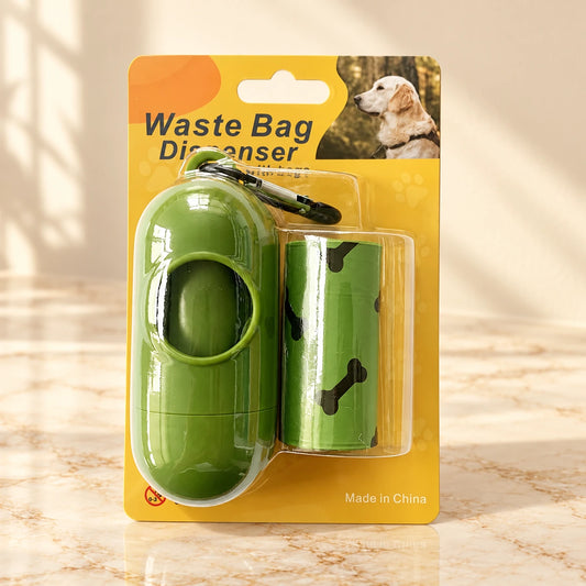 Olive waste-bag dispenser and two-roll set in its original blister packaging on ivory marble