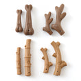 Load image into Gallery viewer, Collection of eight dog chew toys in stick and bone shapes in two colors on white background
