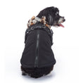 Charger l'image dans la visionneuse de la galerie, Black camo winter dog coat displayed on a studio background, showing soft fleece lining and convenient pockets
