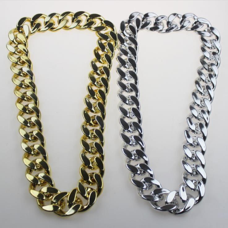 Two big plastic chain necklaces side by side, one gold and one silver