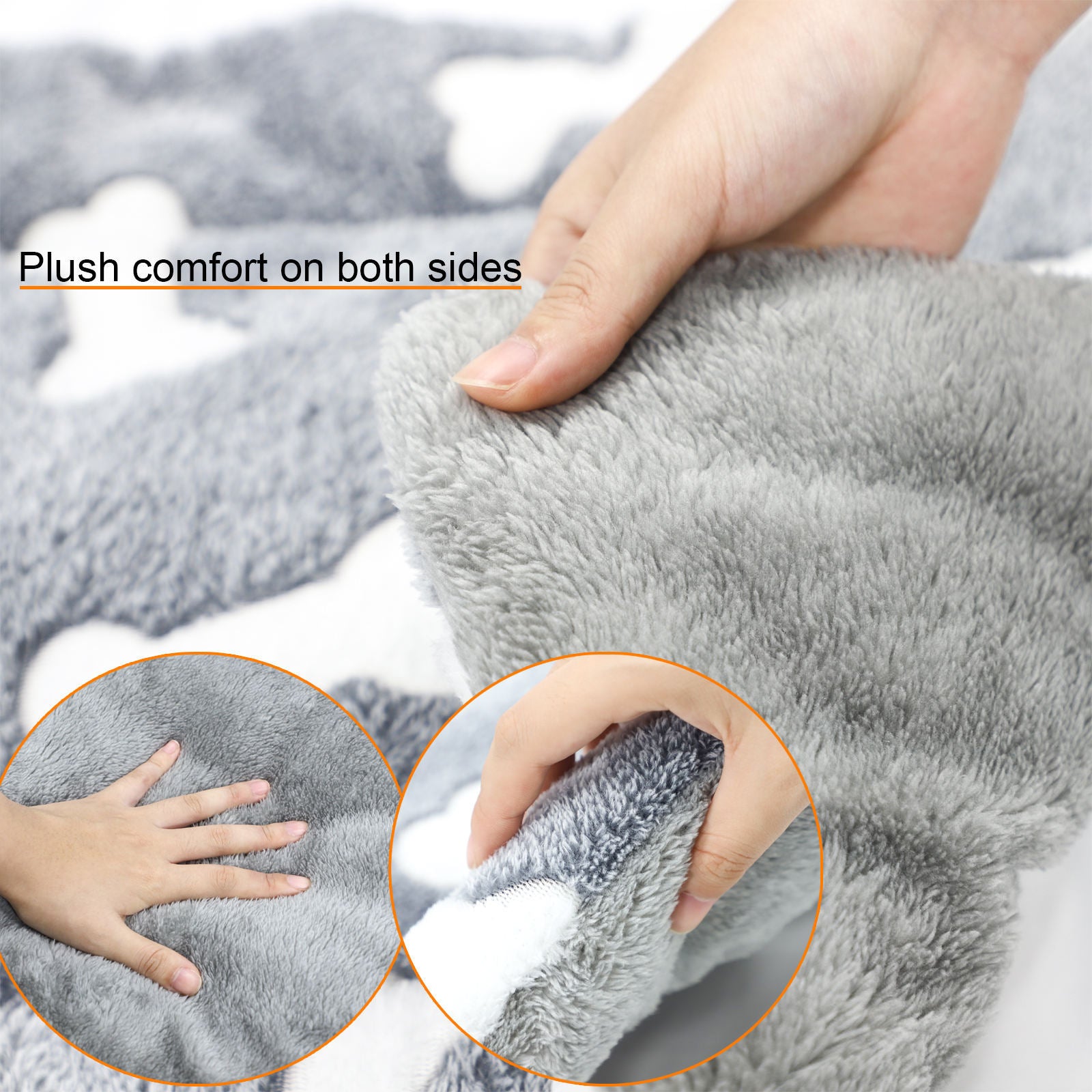 Close-up of hand touching soft gray fleece fabric on reversible pet bed mat