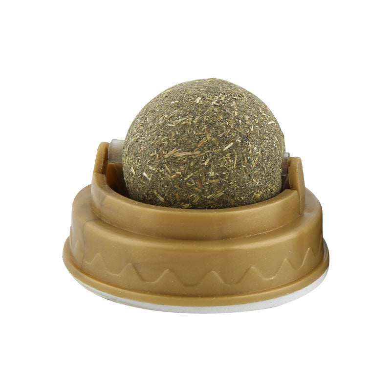 Catnip ball in brown plastic base isolated on white background