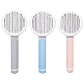 Load image into Gallery viewer, Set of three pet hair combs with round heads in gray, blue, and pink colors
