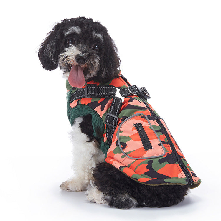 Black and white dog on white background modeling orange camo insulated dog jacket with adjustable harness straps  