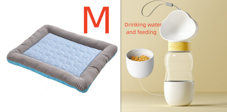 Medium-sized blue cooling pet bed mat with gray striped edges shown next to a beige and white pet water and food dispenser.