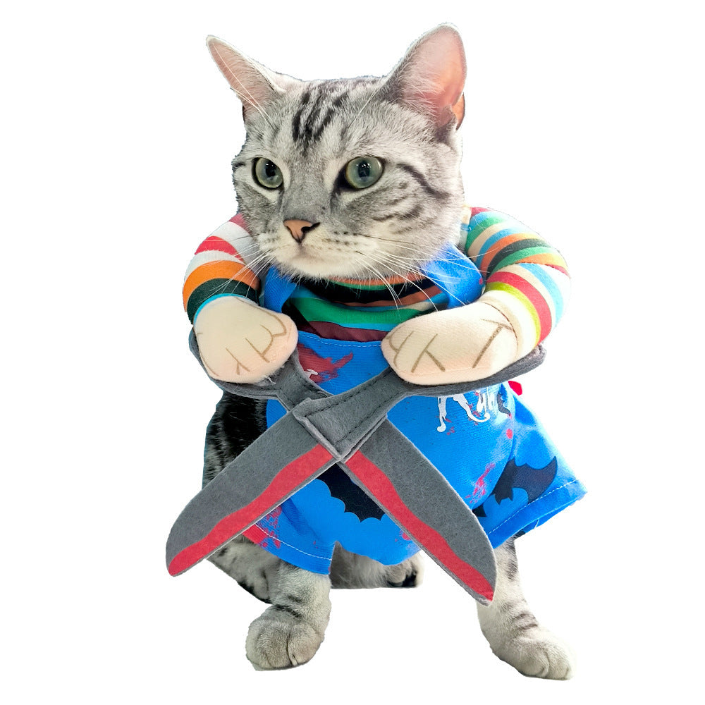 Cat wearing colorful striped long-sleeve scissor hands costume with crossed plush scissors in front