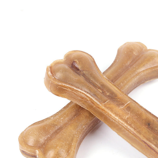Close-up detail of natural buffalo leather texture and bone shape edges on dog chews