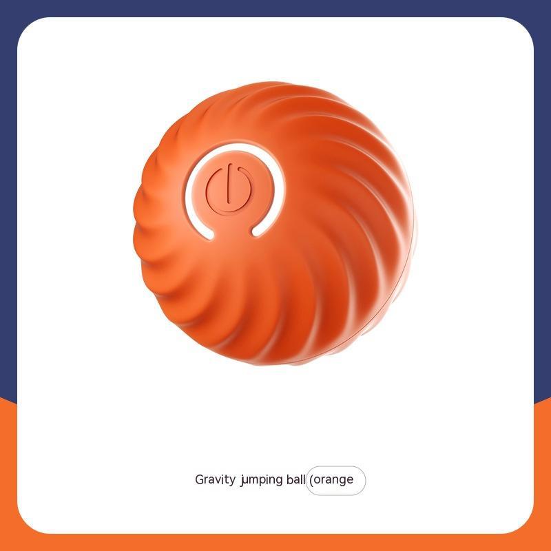 Close-up of orange LED interactive jumping ball with spiral texture