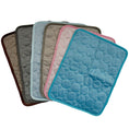Load image into Gallery viewer, Multiple pet sofa mats in six colors and quilted patterns displayed spread out
