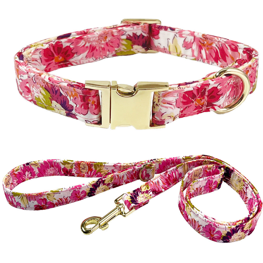 Pink floral dog collar with gold buckle paired with matching floral leash