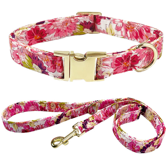 Pink floral dog collar with gold buckle paired with matching floral leash