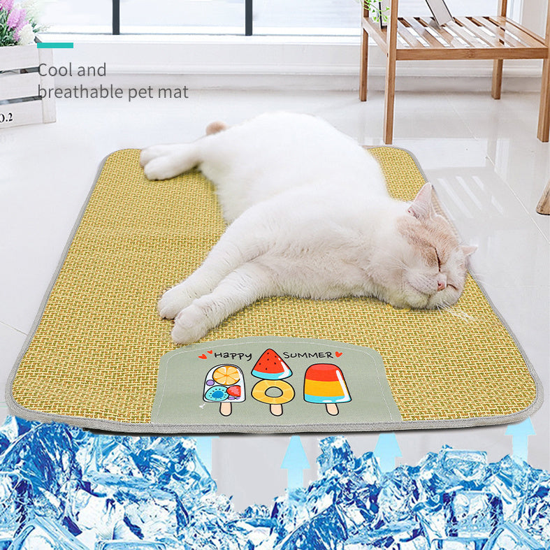 White cat sleeping comfortably on a yellow woven cooling pet mat with colorful ice cream patch