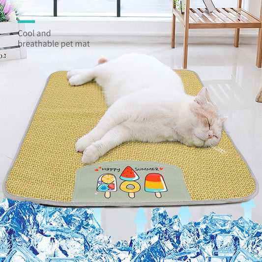 White cat sleeping comfortably on a yellow woven cooling pet mat with colorful ice cream patch