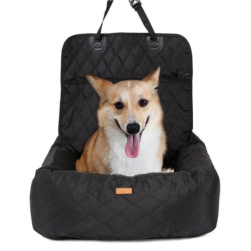 Black quilted convertible dog car seat bed with a corgi inside, highlighting comfort and secure strap attachments