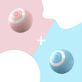 Load image into Gallery viewer, Split image showing the pink and blue versions of the interactive automatic cat toy balls side by side
