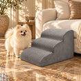 Charger l'image dans la visionneuse de la galerie, Cream Pomeranian beside grey three-step foam pet stairs leading to a low cream sofa.
