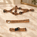 Load image into Gallery viewer, Tan and black Greek key dog harness, collar and leash on beige marble
