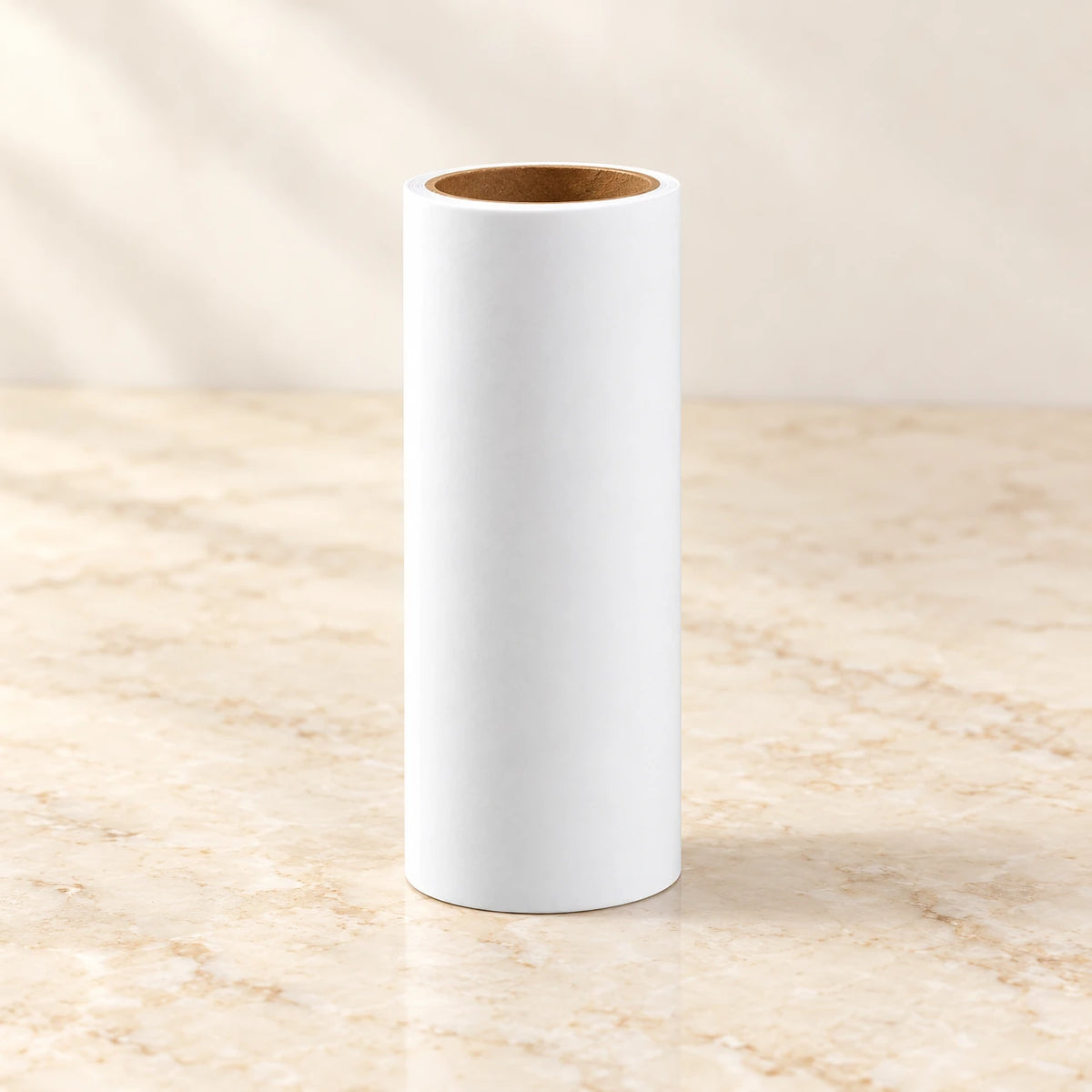 Single white replacement adhesive paper roll with cardboard core, without handle