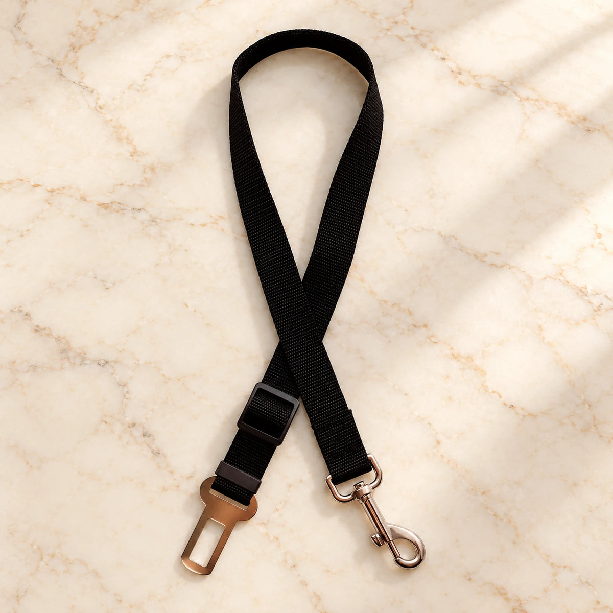 Black adjustable pet car tether with metal seatbelt clip and swivel snap hook