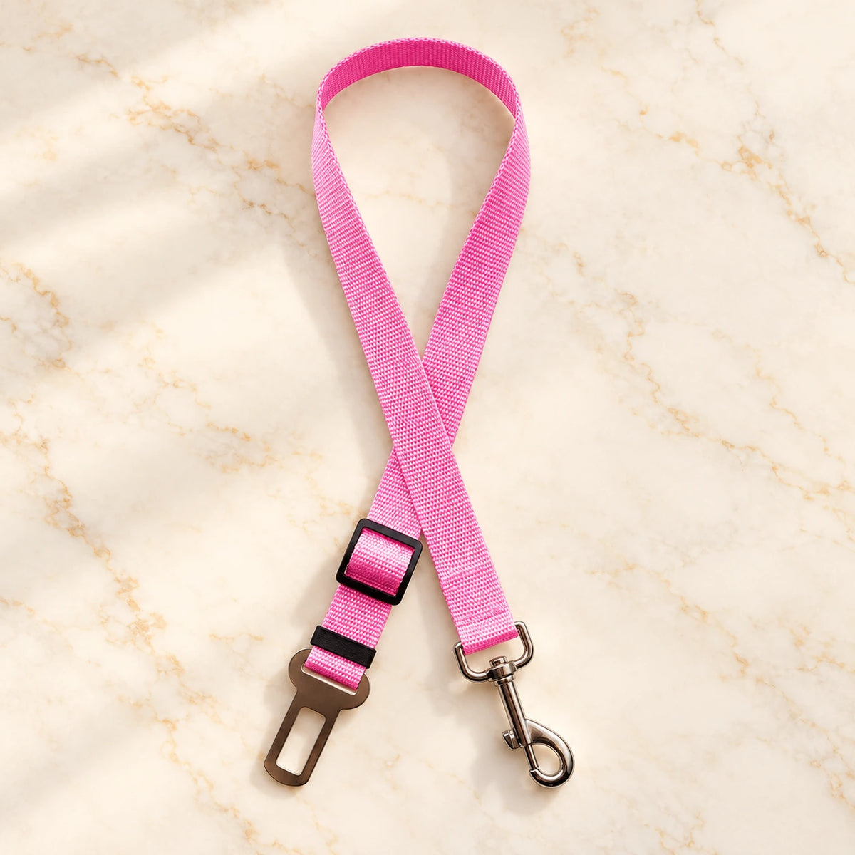 Pink adjustable pet car tether with metal seatbelt clip and swivel snap hook