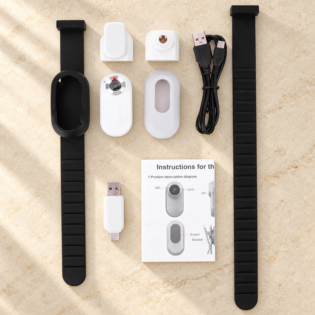 White pet camera collar kit with black straps, mounts, cable and card reader