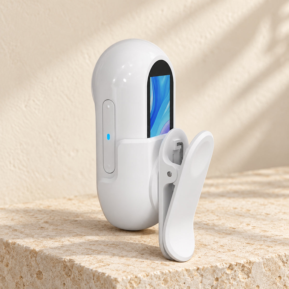 White pet camera showing rear screen and matching attachment clip