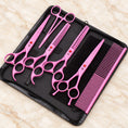 Load image into Gallery viewer, Pink pet grooming set with four scissors, comb and forceps in an open black zip case
