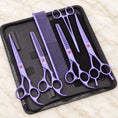 Load image into Gallery viewer, Purple pet grooming set with four scissors, comb and forceps in an open black zip case
