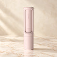 Load image into Gallery viewer, Pink reusable pet hair remover brush on an ivory marble surface
