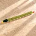 Load image into Gallery viewer, Full-length green snake snuffle toy with yellow tail tip and red tongue
