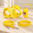 Charger l'image dans la visionneuse de la galerie, Yellow dog harness, collar, lead and bag holder arranged on beige marble
